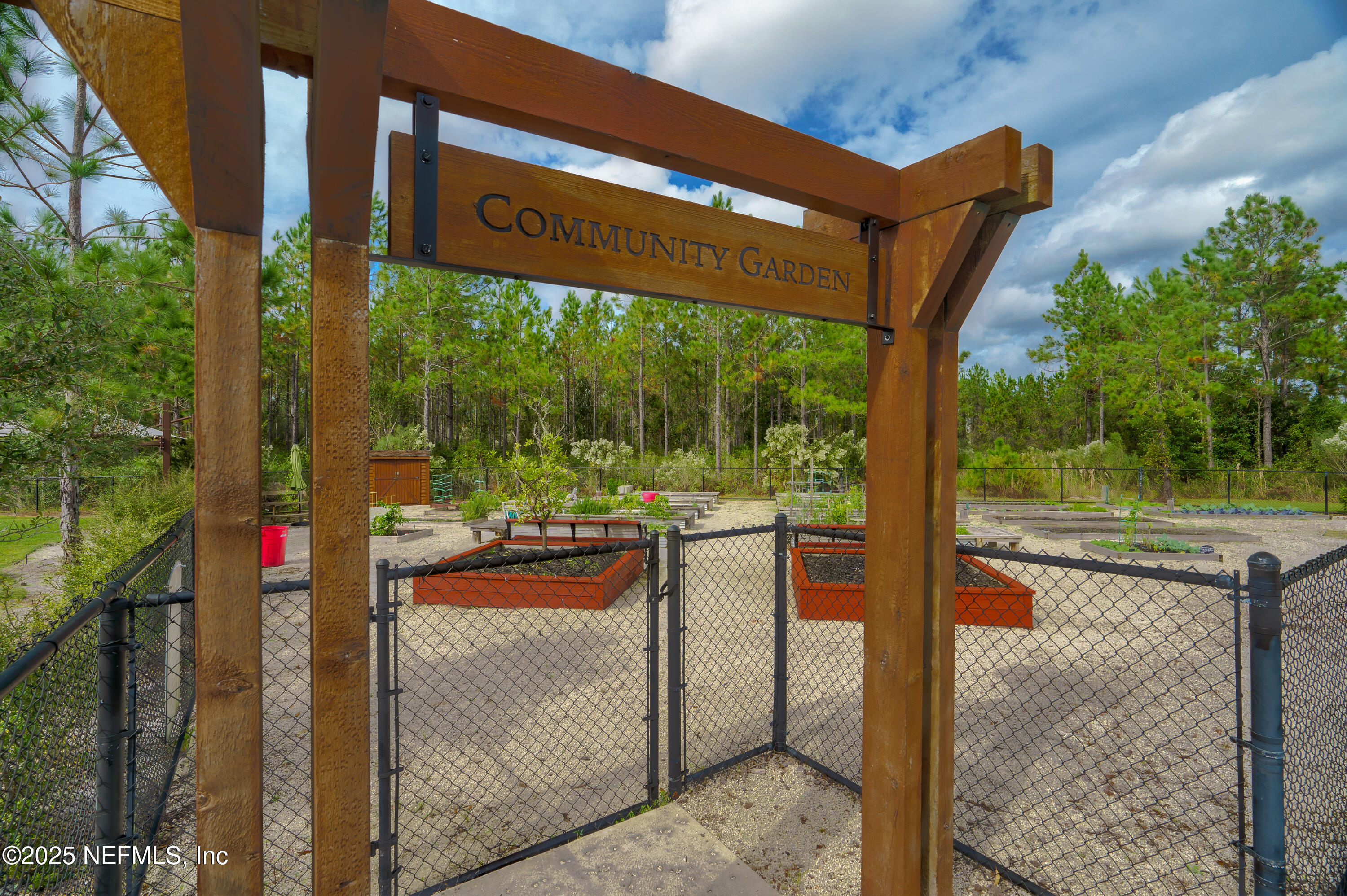 295 Seahill Drive St. Augustine, FL 32092 - Photo 100 of 101 a view of a porch with a floor to ceiling window next to a yard