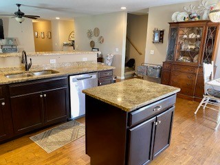 5006 Jimmie Neal Road Baxter, TN 38544 - Photo 11 of 22 a kitchen with a stove a sink and a refrigerator