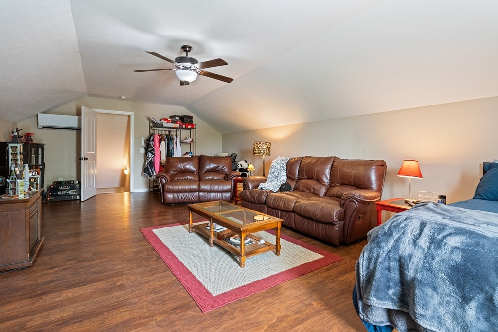 5006 Jimmie Neal Road Baxter, TN 38544 - Photo 18 of 22 a living room with furniture and a wooden floor