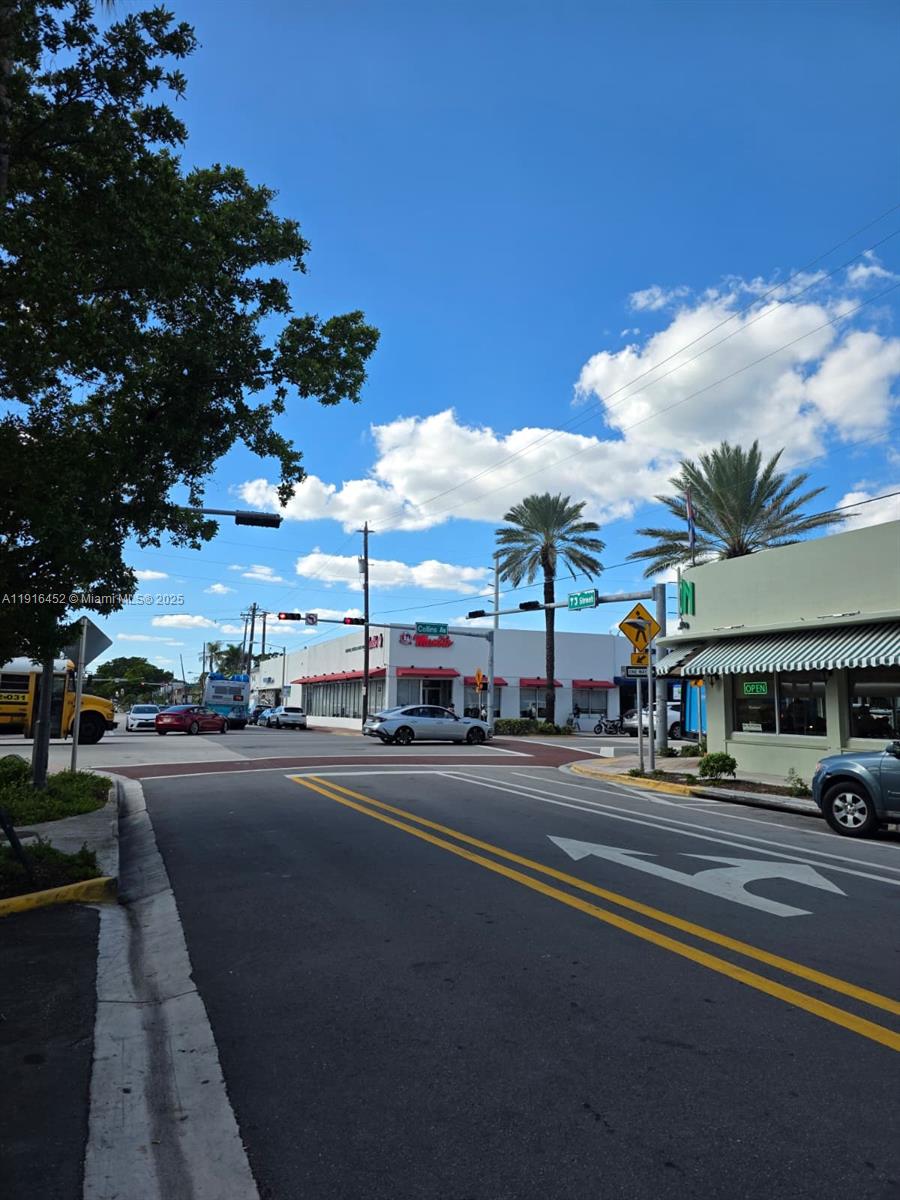 7440 Harding Avenue, Unit 204 Miami Beach, FL 33141 - Photo 1 of 37 a view of a city street from a building