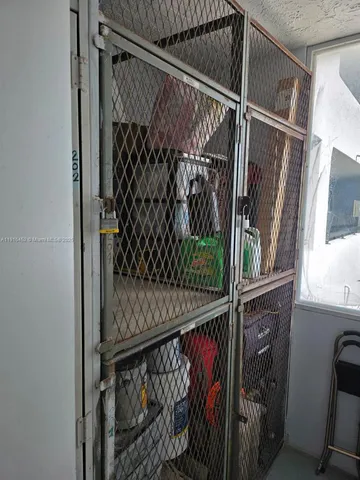 a view of a backyard with plants and a patio