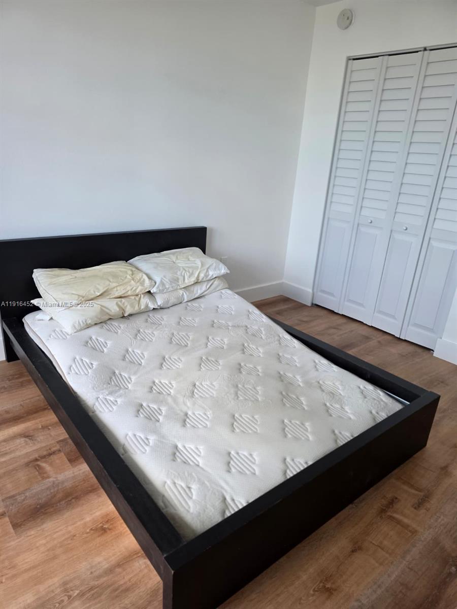 7440 Harding Avenue, Unit 204 Miami Beach, FL 33141 - Photo 19 of 37 a close view of wooden floor