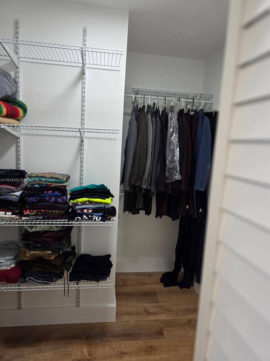 7440 Harding Avenue, Unit 204 Miami Beach, FL 33141 - Photo 27 of 37 a room with storage and utility