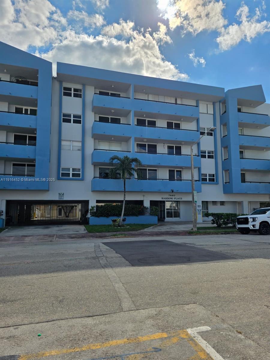 7440 Harding Avenue, Unit 204 Miami Beach, FL 33141 - Photo 3 of 37 a view of a building and a street