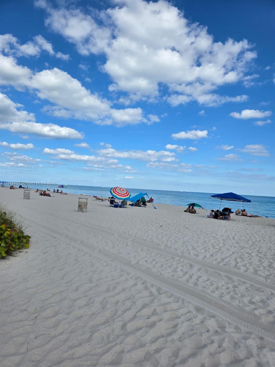 7440 Harding Avenue, Unit 204 Miami Beach, FL 33141 - Photo 34 of 37 a view of an ocean beach