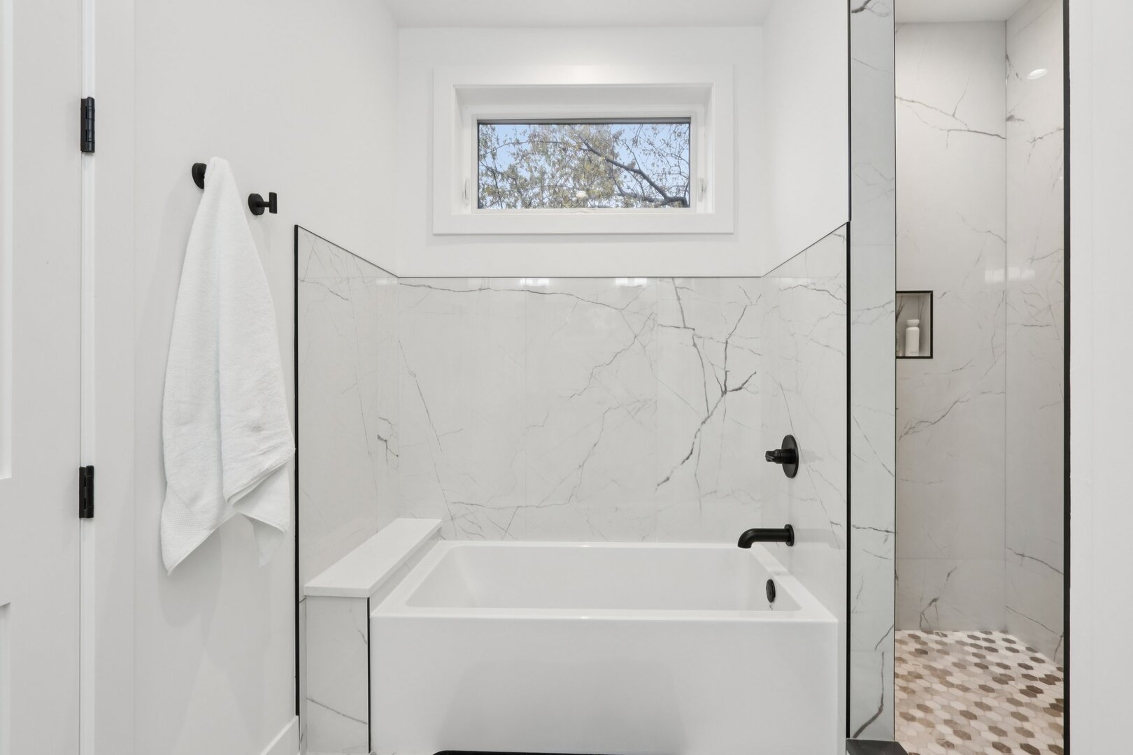 4119 North Ashland Avenue, Unit 3N Chicago, IL 60613 - Photo 23 of 33 a bathroom with a bathtub and a shower