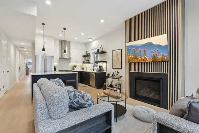 a living room with furniture and a table