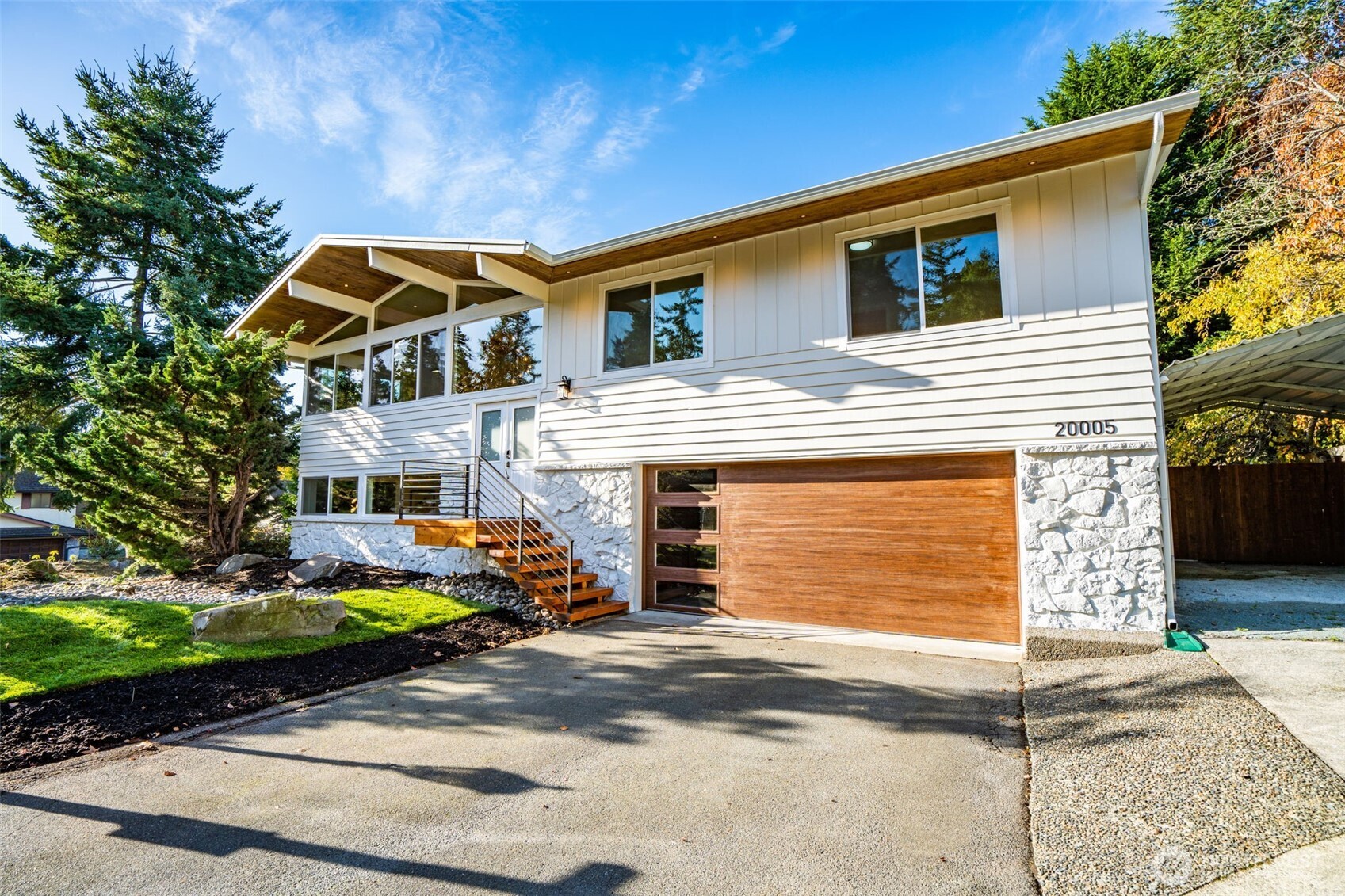a front view of a house with garden