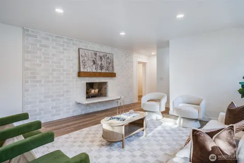 a living room with furniture and a rug
