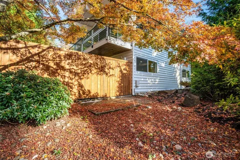 a backyard of a house with lots of green space