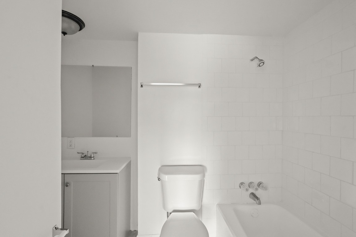 105 West Linney Street Dayton, TX 77535 - Photo 30 of 48 a bathroom with a bathtub and a sink