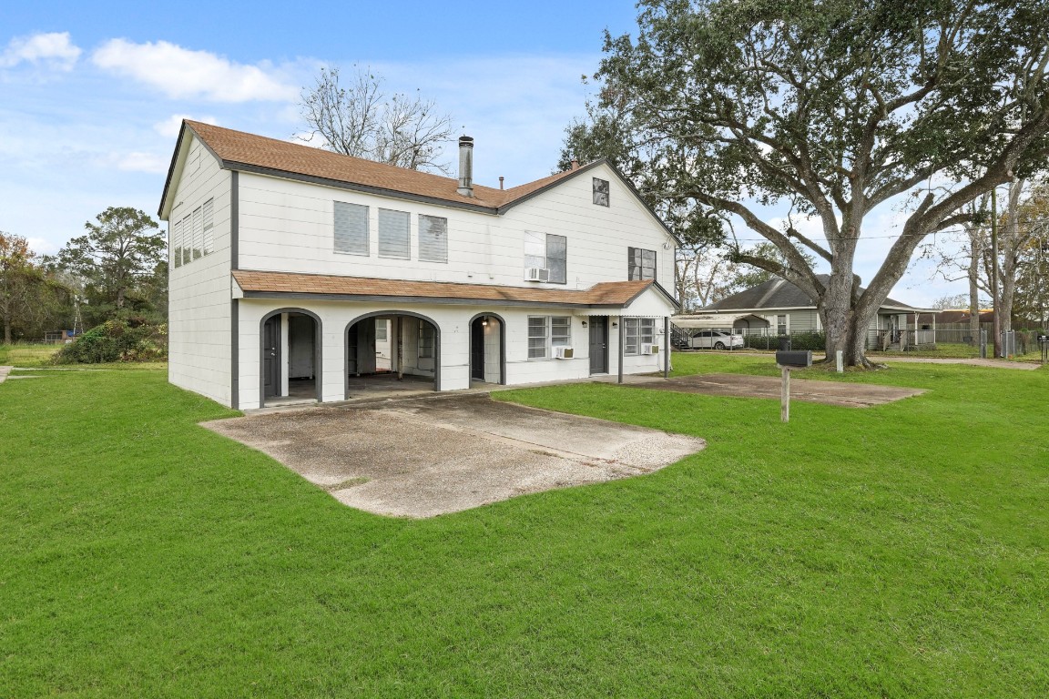 105 West Linney Street Dayton, TX 77535 - Photo 3 of 48 a view of outdoor space yard and front view of a house