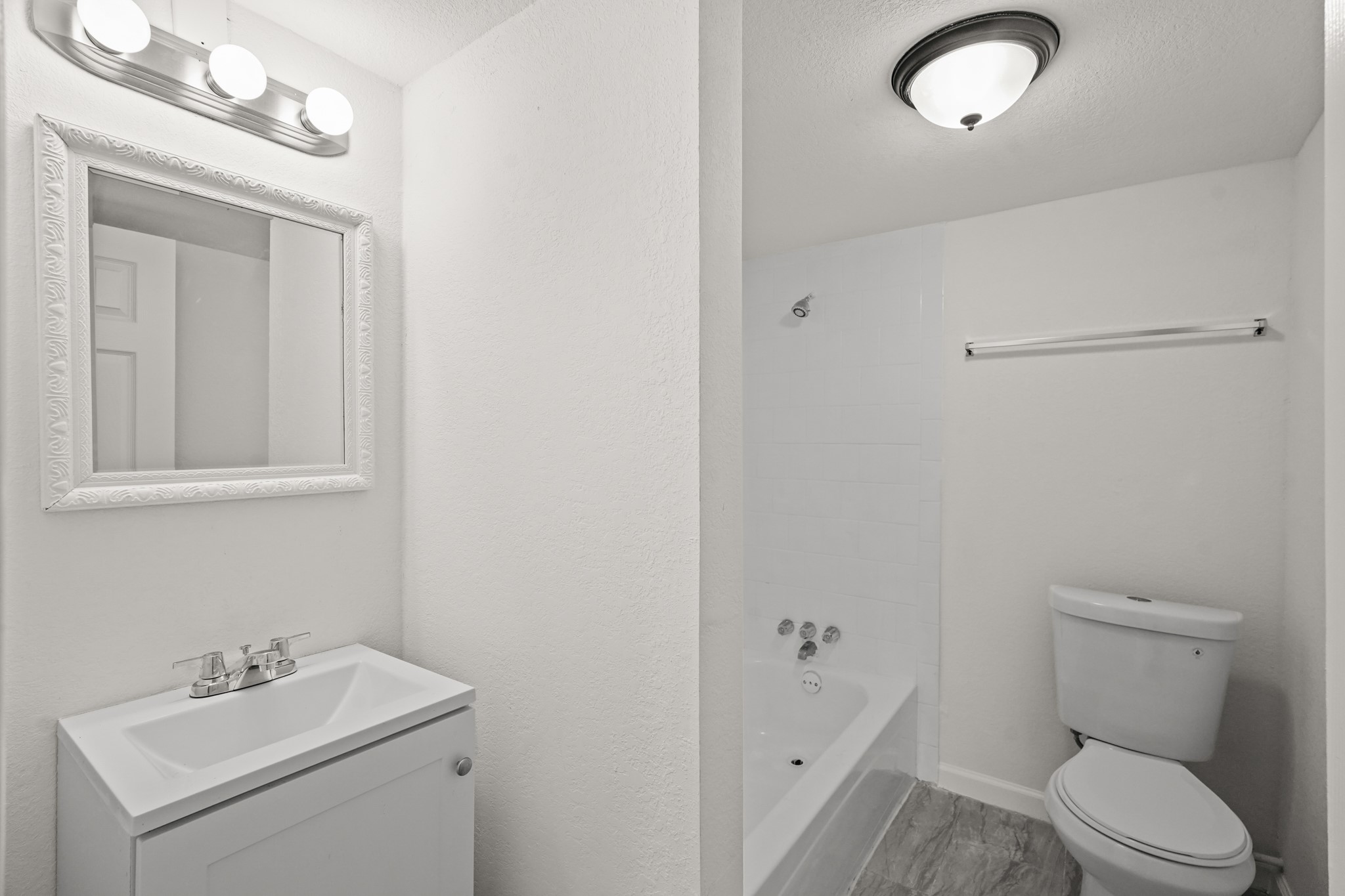 105 West Linney Street Dayton, TX 77535 - Photo 42 of 48 a bathroom with a sink a toilet and shower