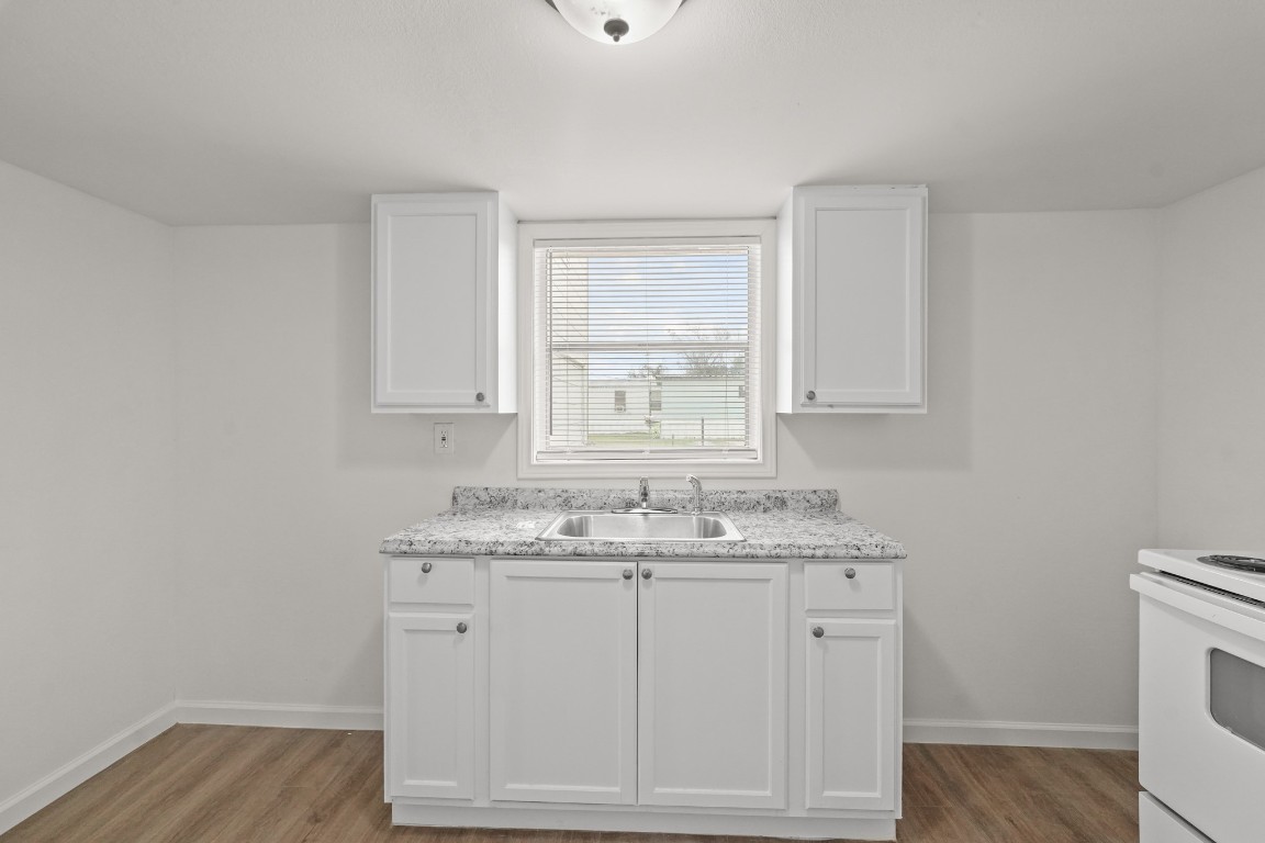 105 West Linney Street Dayton, TX 77535 - Photo 43 of 48 a bathroom with a sink and a mirror