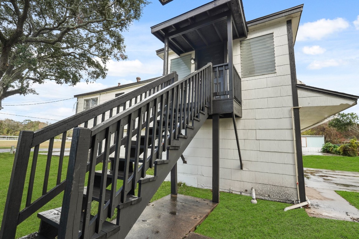 105 West Linney Street Dayton, TX 77535 - Photo 6 of 48 a view of deck with a backyard