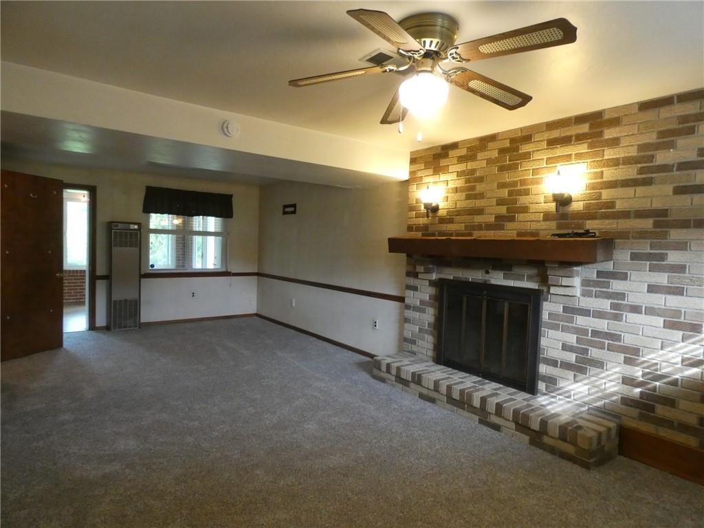 8459 Ridgemont Road Pittsburgh, PA 15237 - Photo 25 of 31 The morning sun highlights the fireplace with brick hearth!