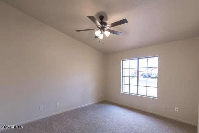 a room with a sink and a mirror
