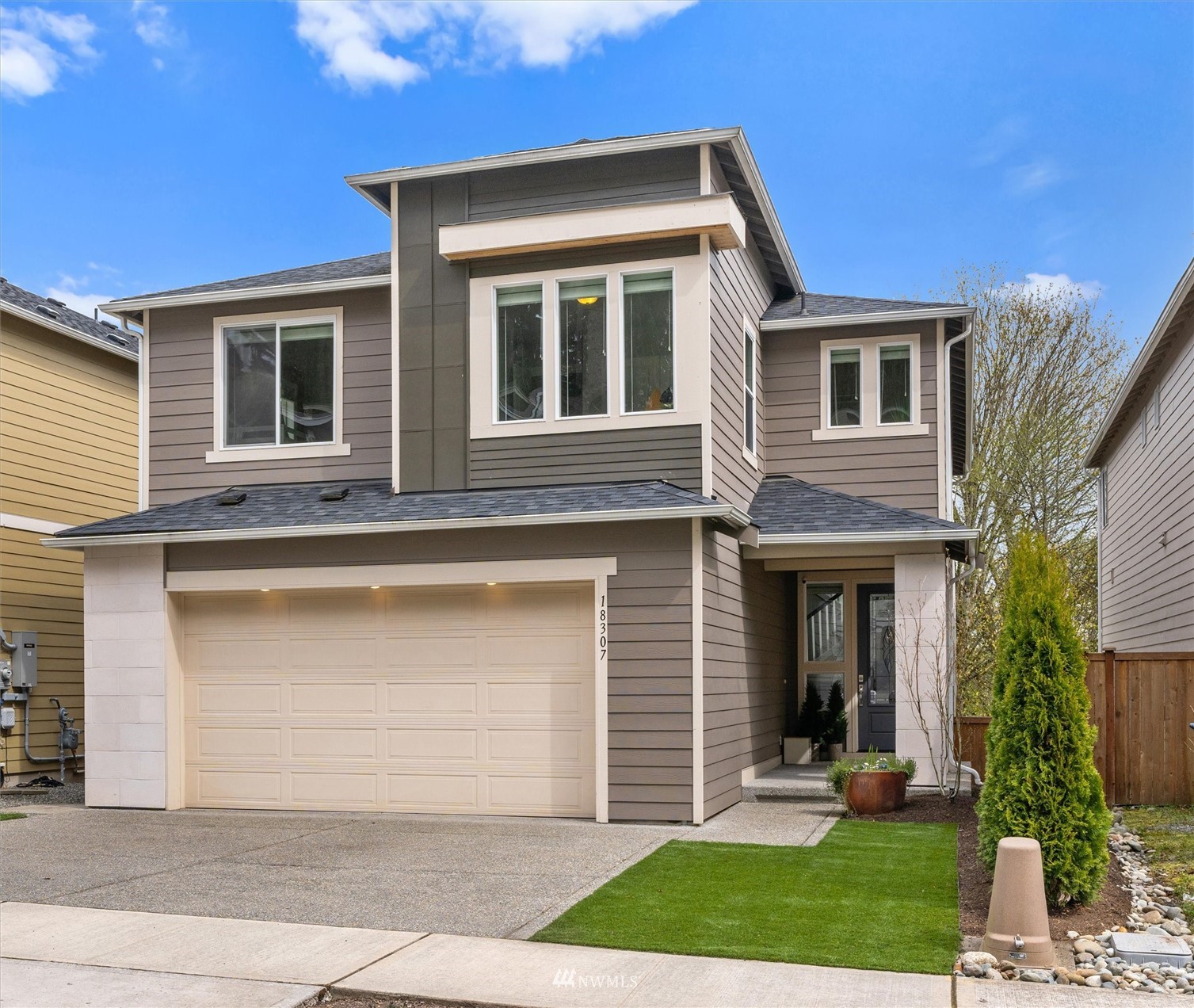 18307 3rd Drive Southeast Bothell, WA 98012 - Photo 1 of 40 a front view of a house with a yard