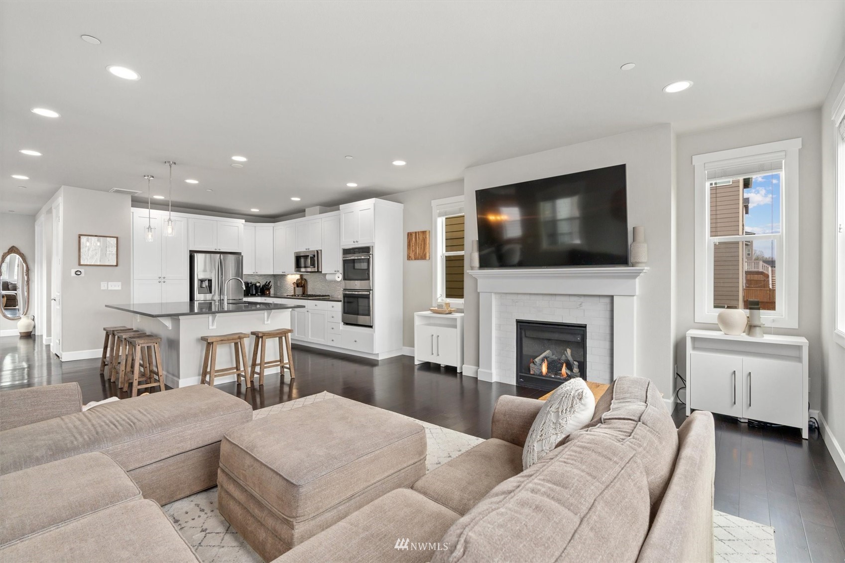 18307 3rd Drive Southeast Bothell, WA 98012 - Photo 14 of 40 a living room with furniture fireplace and flat screen tv