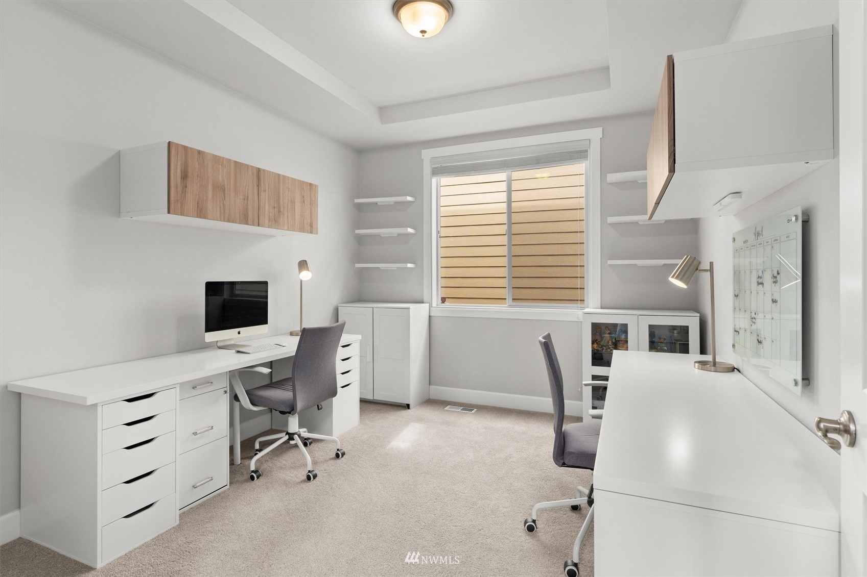 18307 3rd Drive Southeast Bothell, WA 98012 - Photo 5 of 40 a view of a workspace with furniture and a window