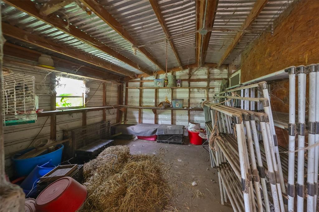 15624 Carlton Lake Road Wimauma, FL 33598 - Photo 17 of 35 a view of storage and utility room