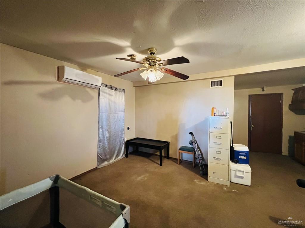 5 Montalvo Hill Road Rio Grande City, TX 78582 - Photo 24 of 42 a room with furniture and white walls