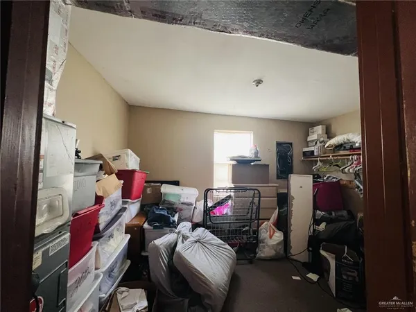 a view of storage and utility room