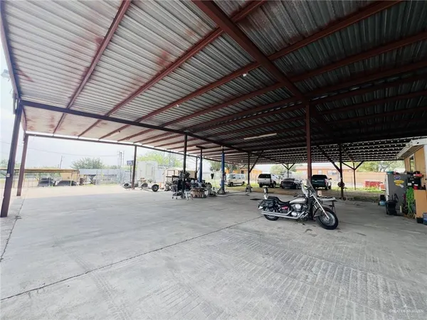 a view of a street with a building