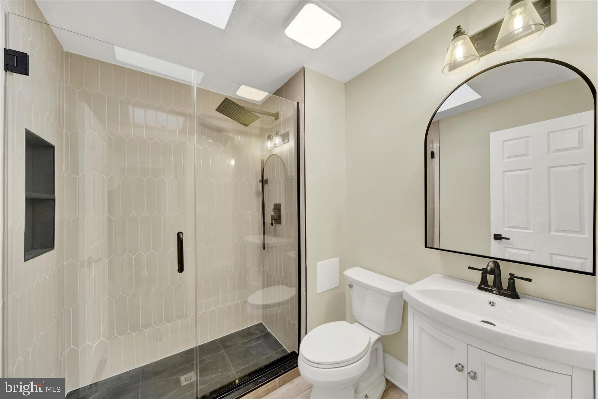 15 East Branch Lane, Unit 22 Baltimore, MD 21201 - Photo 17 of 19 NEW BATHROOM W/ SKYLIGHT