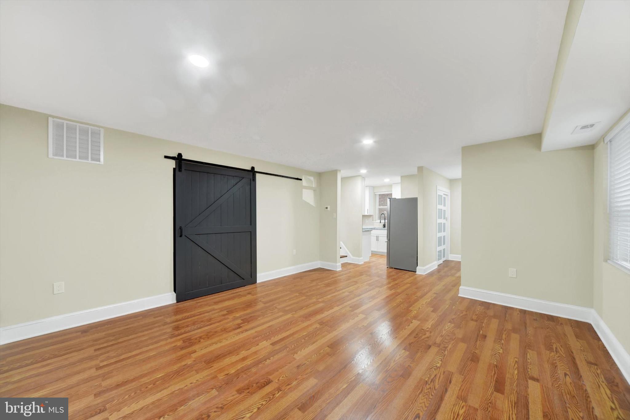 15 East Branch Lane, Unit 22 Baltimore, MD 21201 - Photo 6 of 19 GLEAMING HARDWOODS