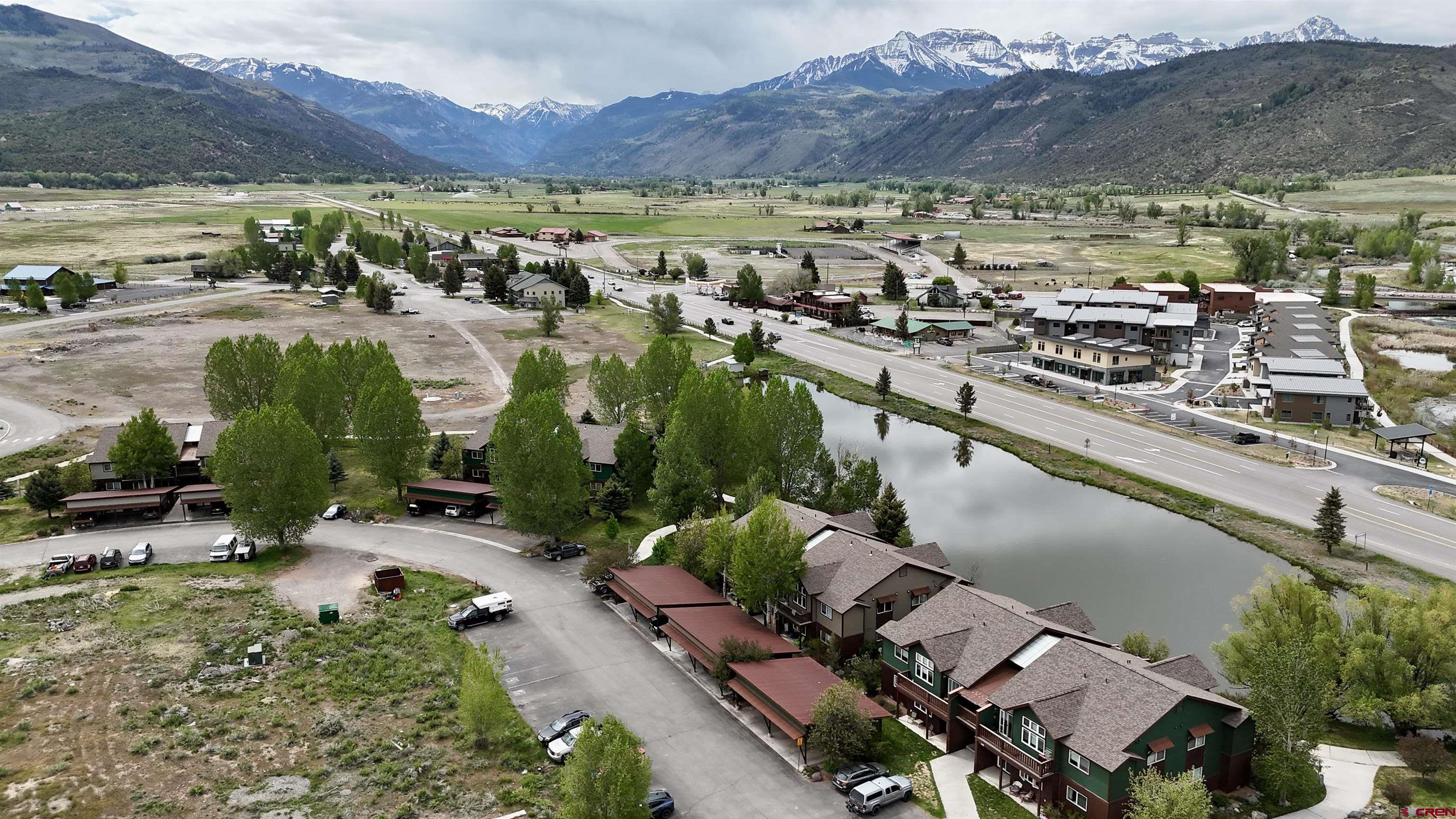 540 Redcliff Circle, Unit E 203 Ridgway, CO 81432 - Photo 5 of 36 a view of a city with a lake