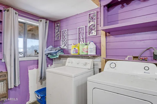 a bathroom with a sink a mirror and shower