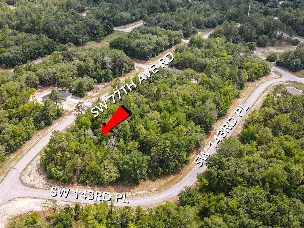0 Southwest 77th Ave Road Ocala, FL 34473 - Photo 1 of 1 an aerial view of residential house with outdoor space and trees all around