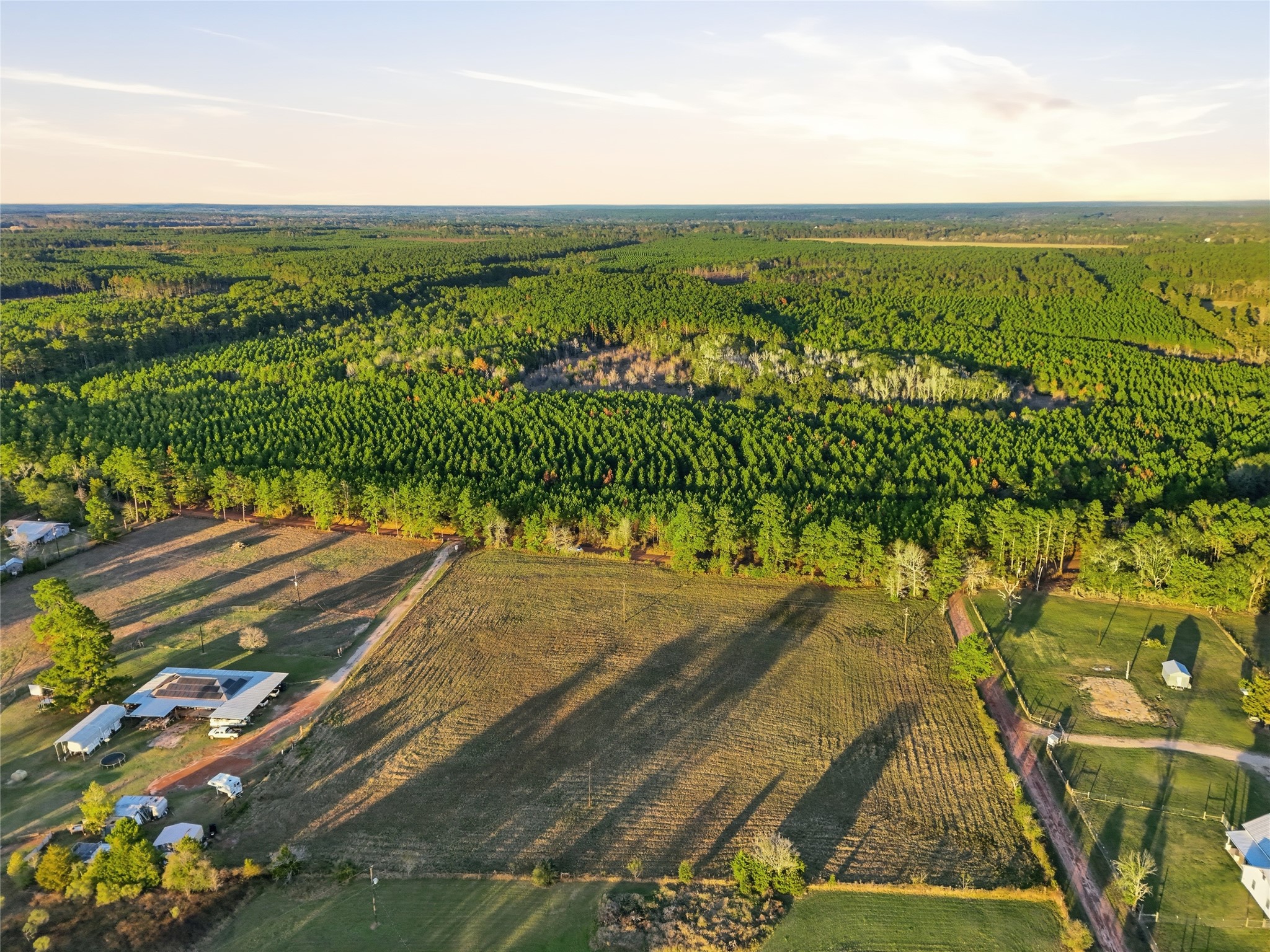 1851 Alsobrooks Road Cleveland, TX 77328 - Photo 13 of 18 an aerial view of residential houses with outdoor space