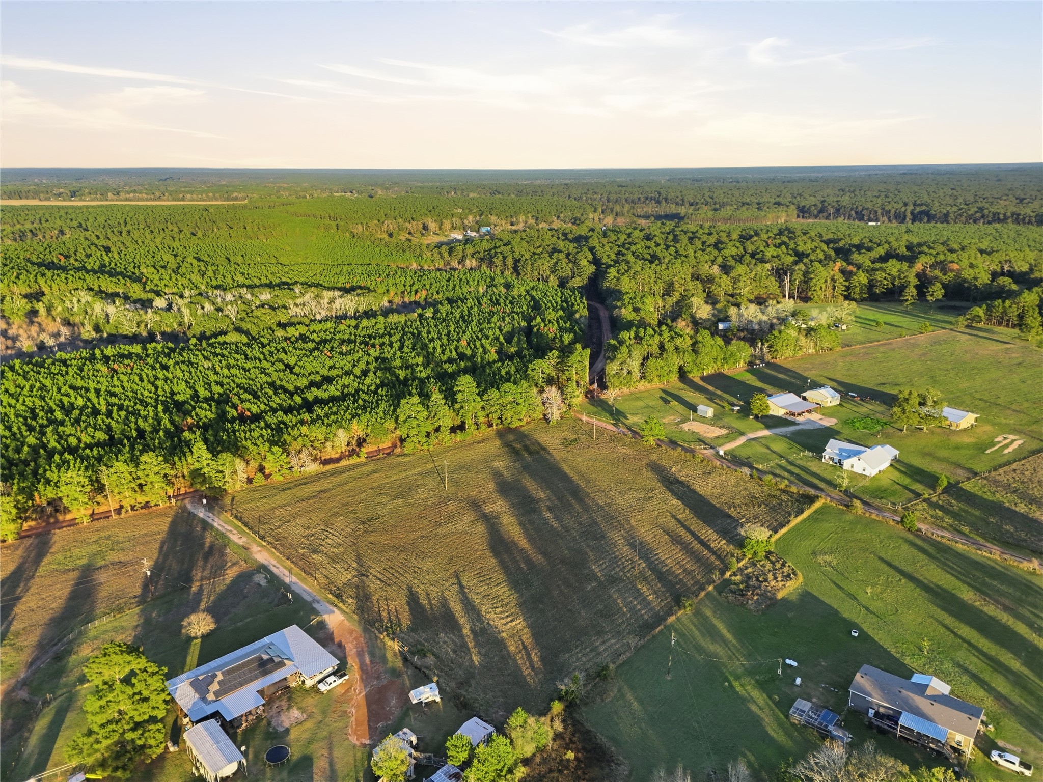 1851 Alsobrooks Road Cleveland, TX 77328 - Photo 14 of 18 an aerial view of residential houses with outdoor space