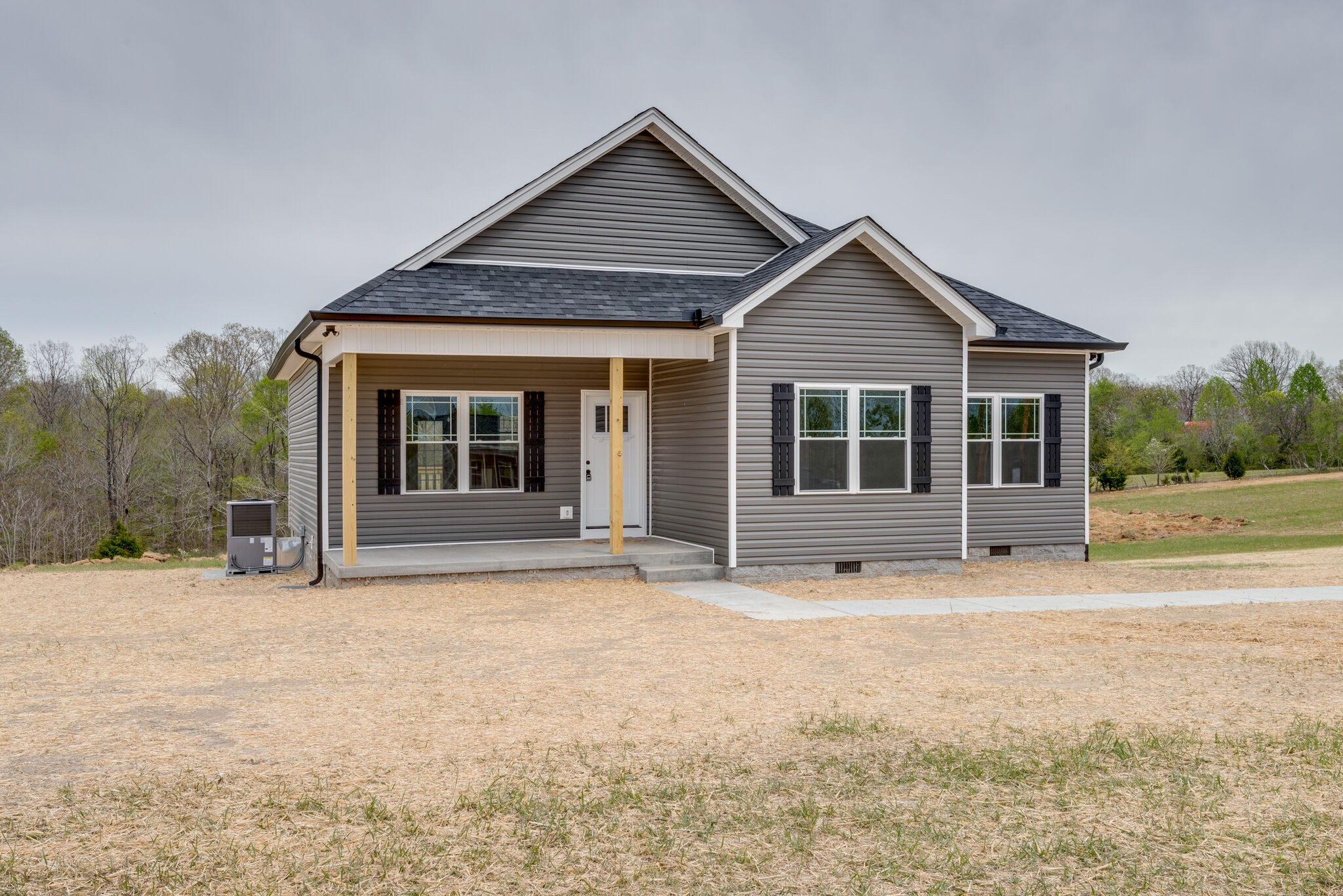 1271 Oak Grove Road Dickson, TN 37055 - Photo 5 of 18 a front view of a house with a yard