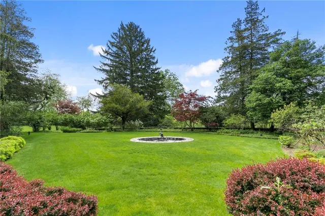 a view of a golf course with a lake