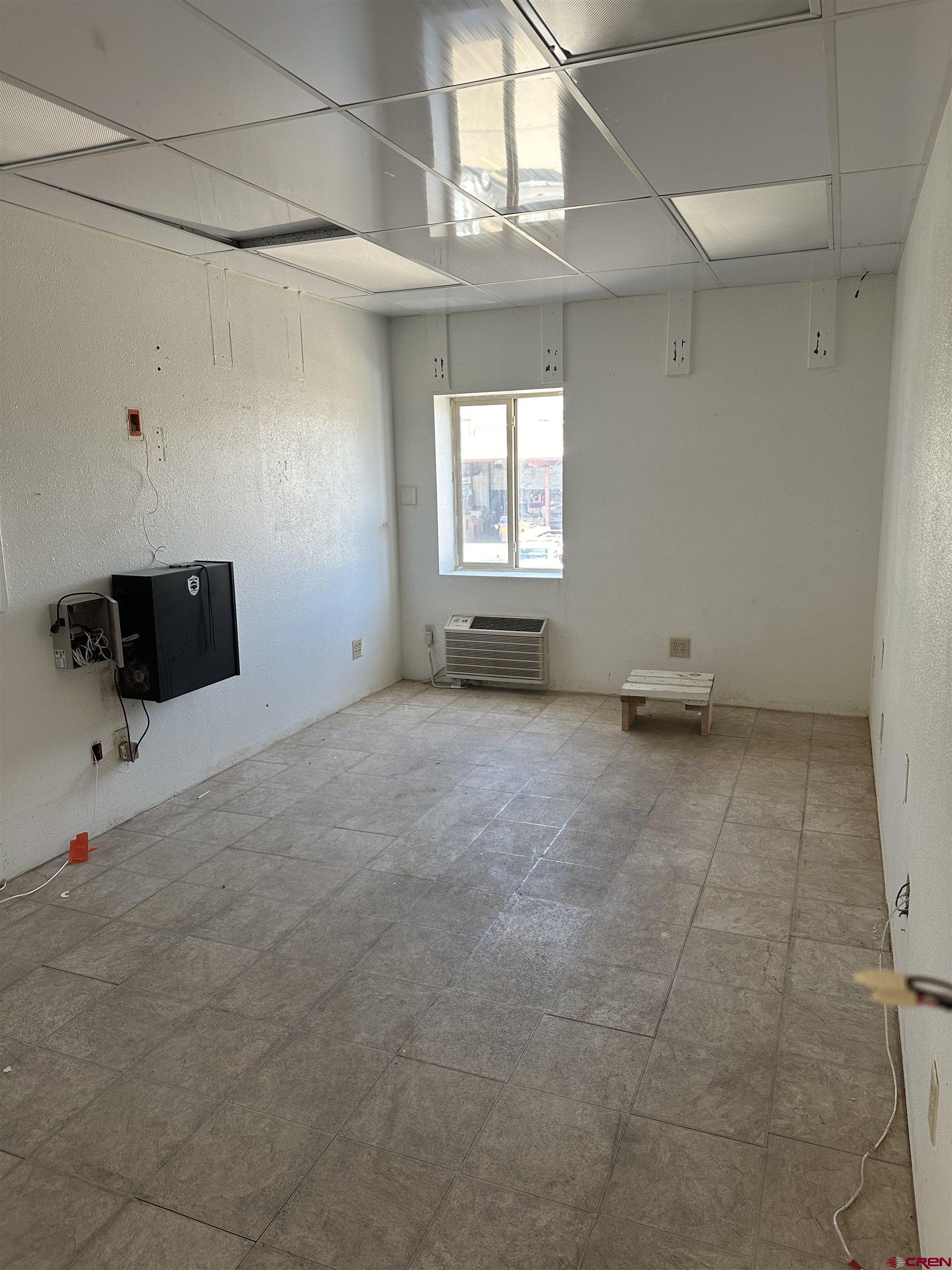 29420 East E Highway, Unit B Durango, CO 81303 - Photo 12 of 15 a view of an empty room with a window