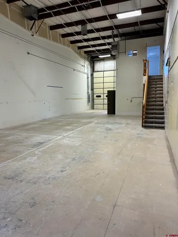 a view of a room with wooden walls