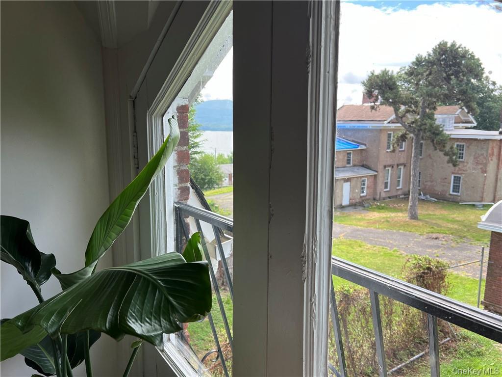 182 Grand Street Newburgh, NY 12550 - Photo 13 of 13 a view of a garden from a window