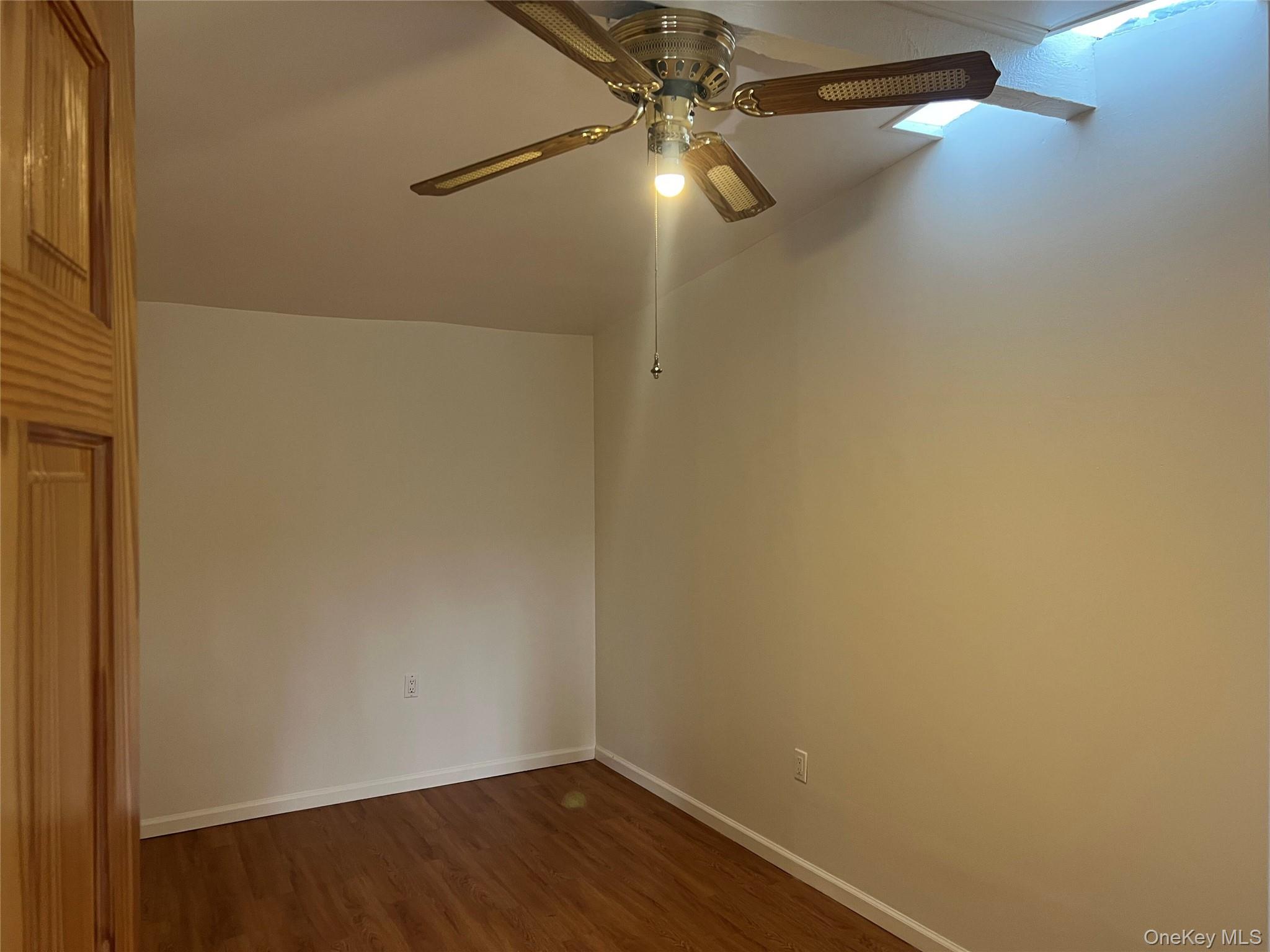 182 Grand Street Newburgh, NY 12550 - Photo 10 of 13 a view of a small space with wooden floor and fan