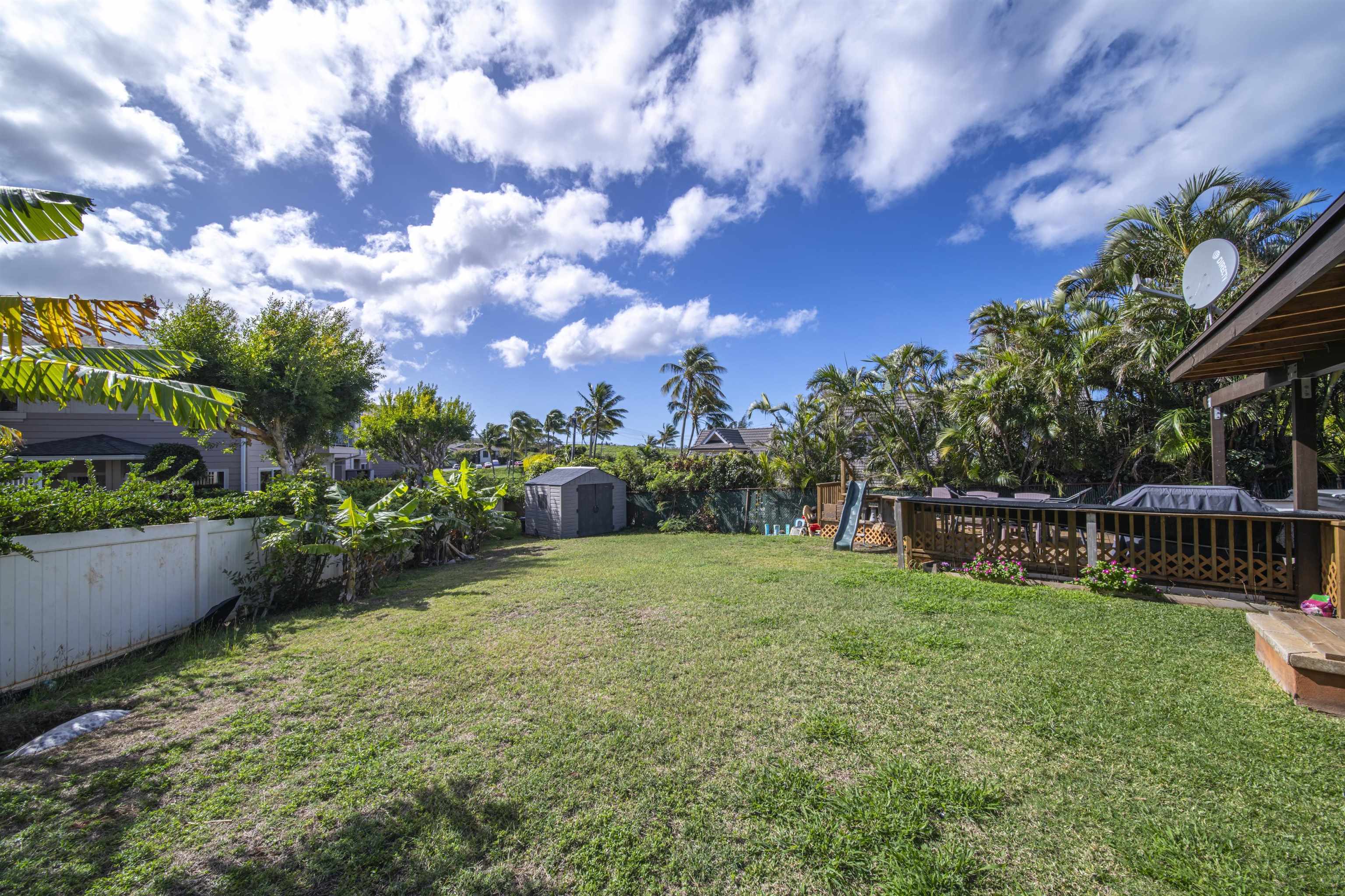 4996 Lower Honoapiilani Road Lahaina, HI 96761 - Photo 11 of 37 a view of a backyard with sitting area