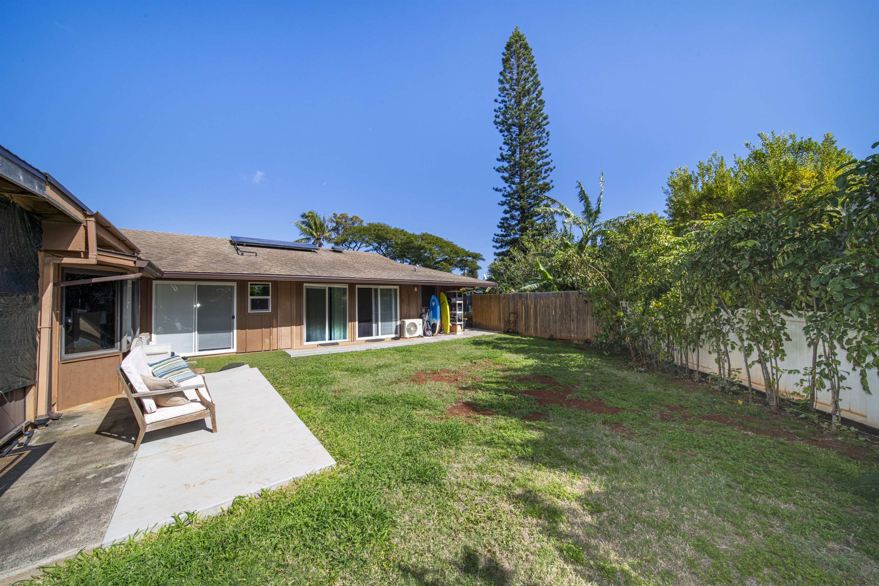 4996 Lower Honoapiilani Road Lahaina, HI 96761 - Photo 13 of 37 a front view of a house with garden