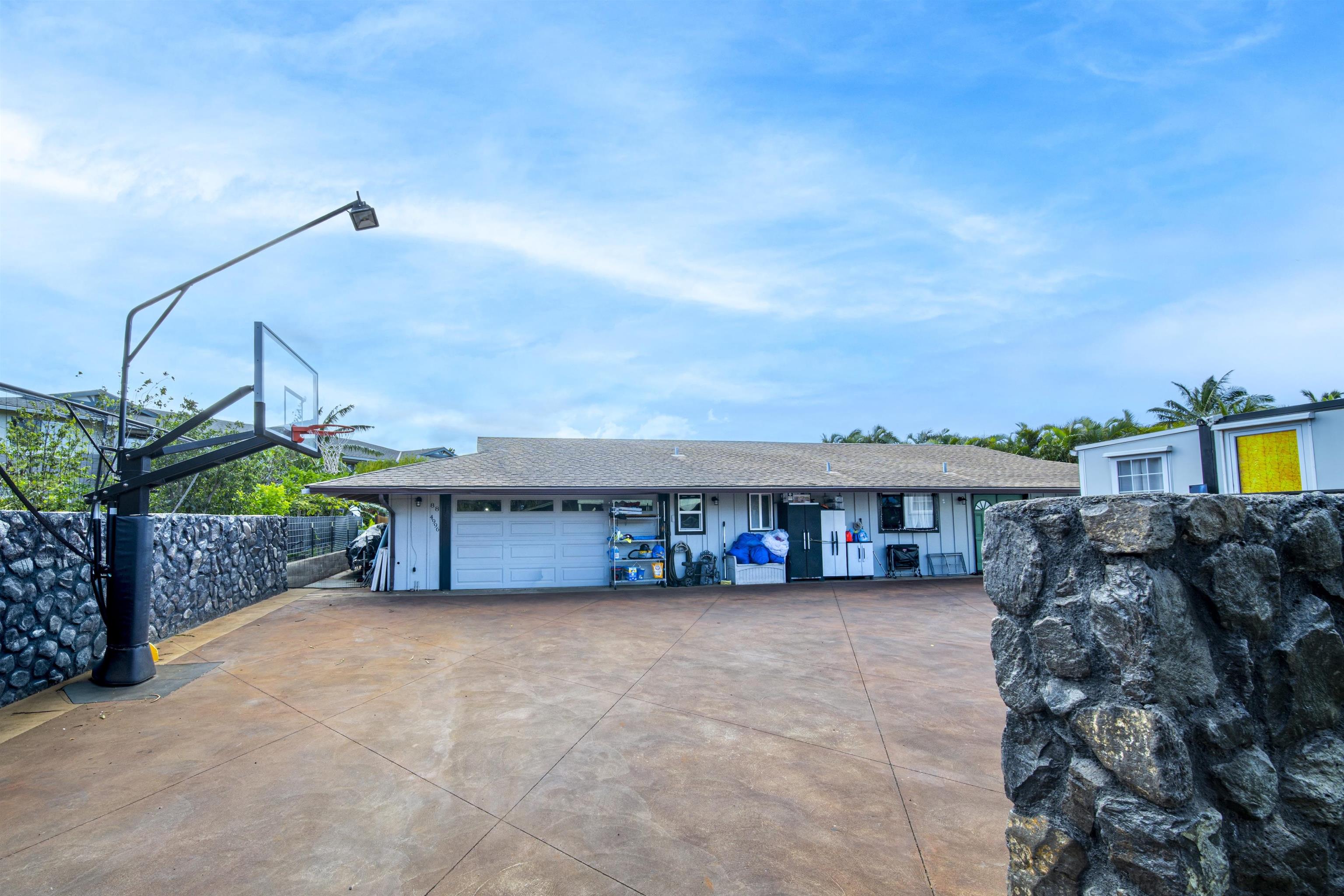 4996 Lower Honoapiilani Road Lahaina, HI 96761 - Photo 33 of 37 a view of house with a swimming pool