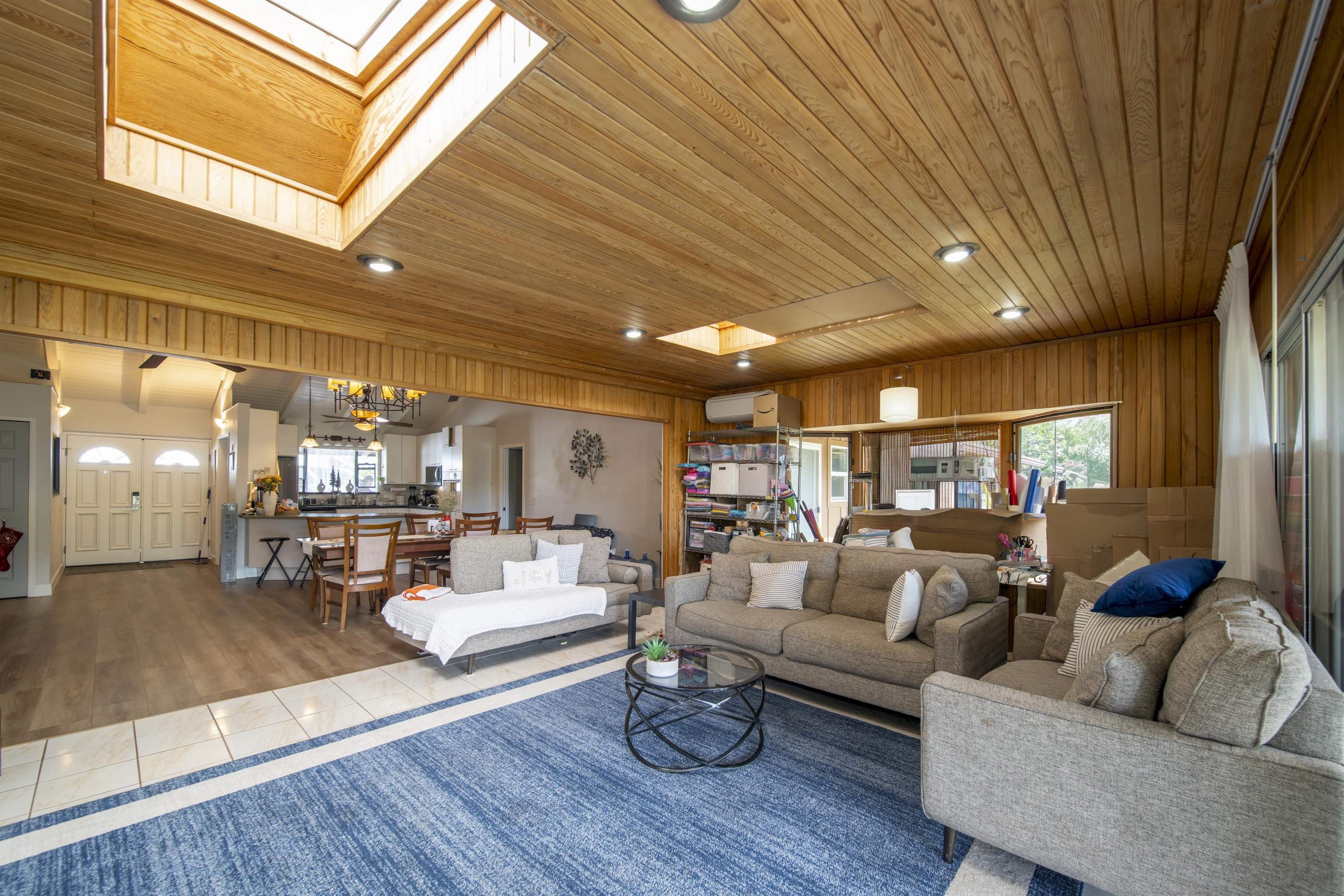 4996 Lower Honoapiilani Road Lahaina, HI 96761 - Photo 5 of 37 a living room with furniture and a wooden floor