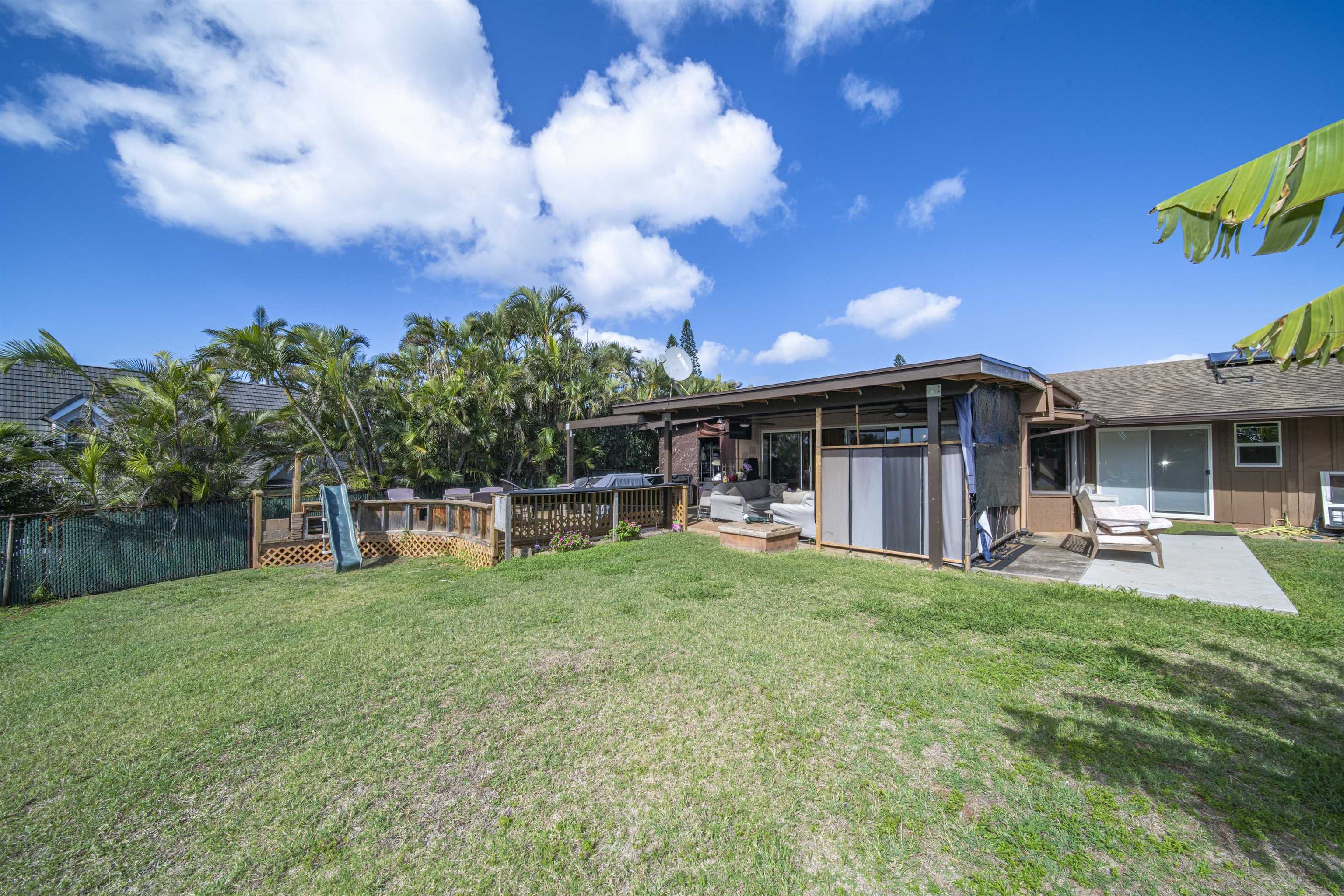 4996 Lower Honoapiilani Road Lahaina, HI 96761 - Photo 10 of 37 a view of a house with backyard porch and sitting area