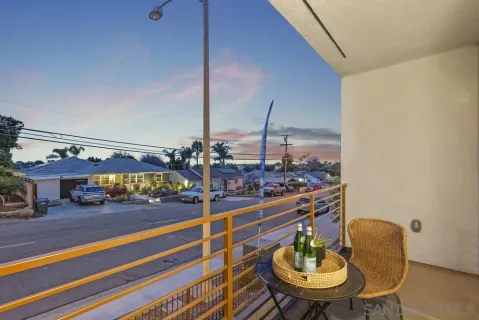 a view of a chairs and table in patio