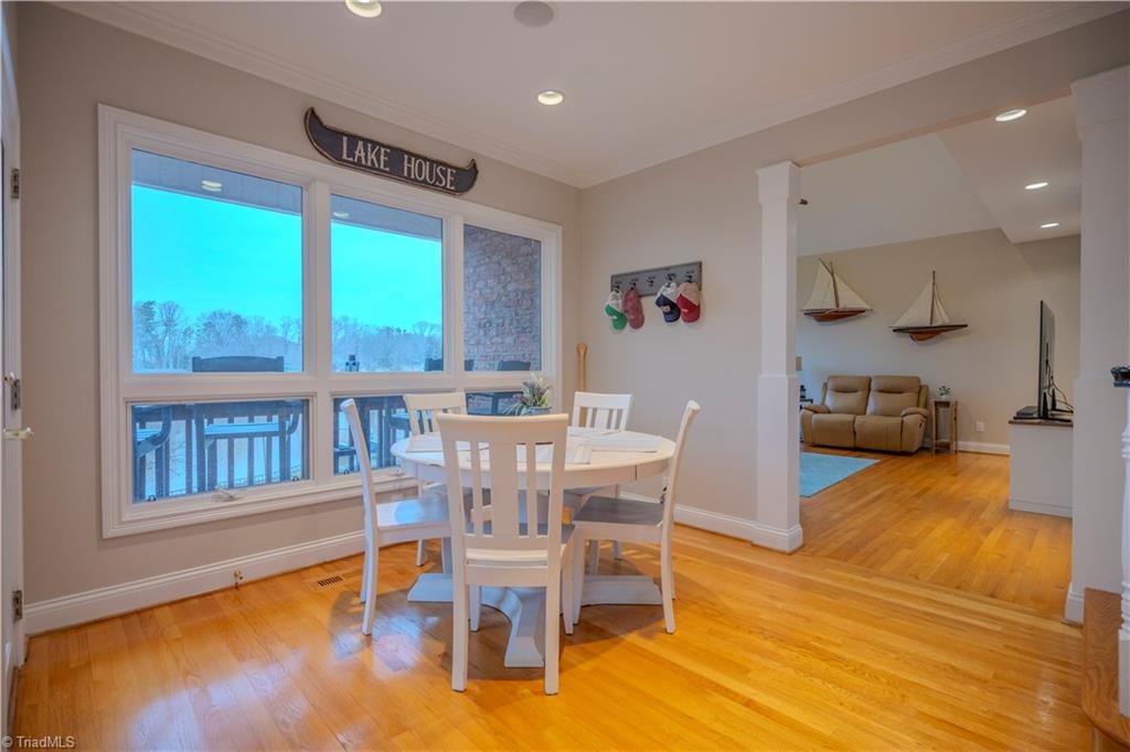 1835 Waterford Pointe Road Lexington, NC 27292 - Photo 12 of 26 Breakfast area overlooking lakeside deck and lake
