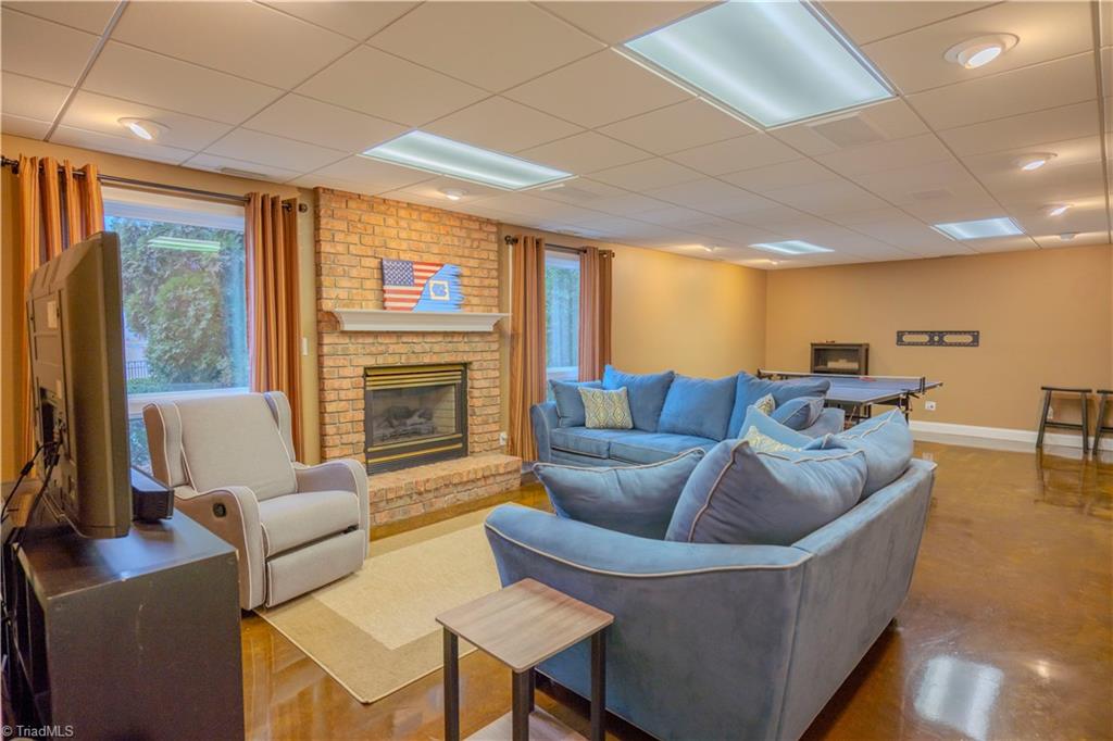 1835 Waterford Pointe Road Lexington, NC 27292 - Photo 19 of 26 Lower level den with room for ping/pong or other games