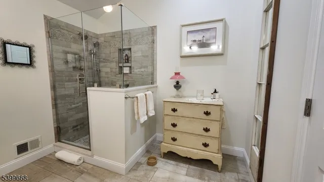 a view of a bedroom with baby crib
